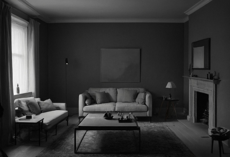 Tonal room tested under layered warm evening lighting