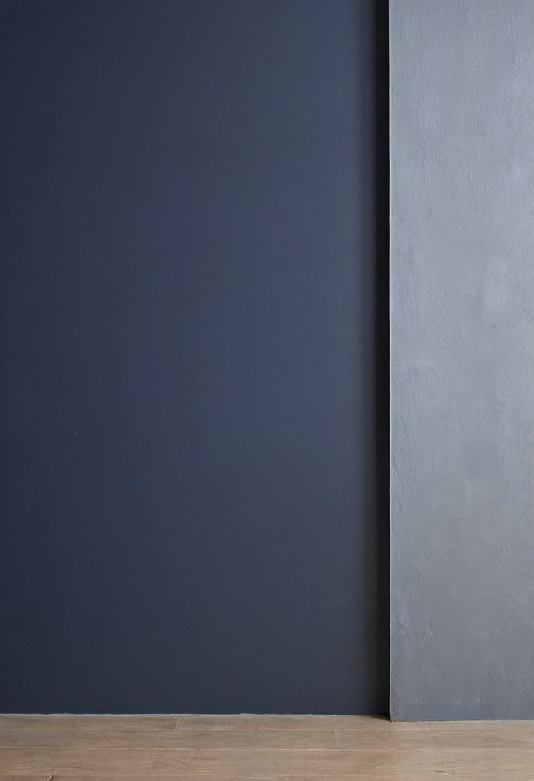 Painted wall showing diffuse color beside a narrow specular highlight