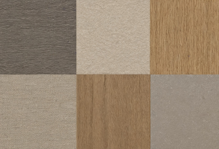 Four coordinated interior finish samples arranged by visual role